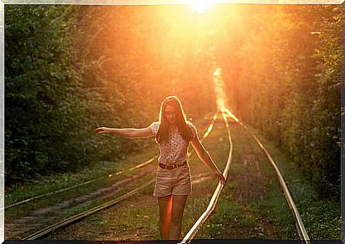 Girl walking down a path