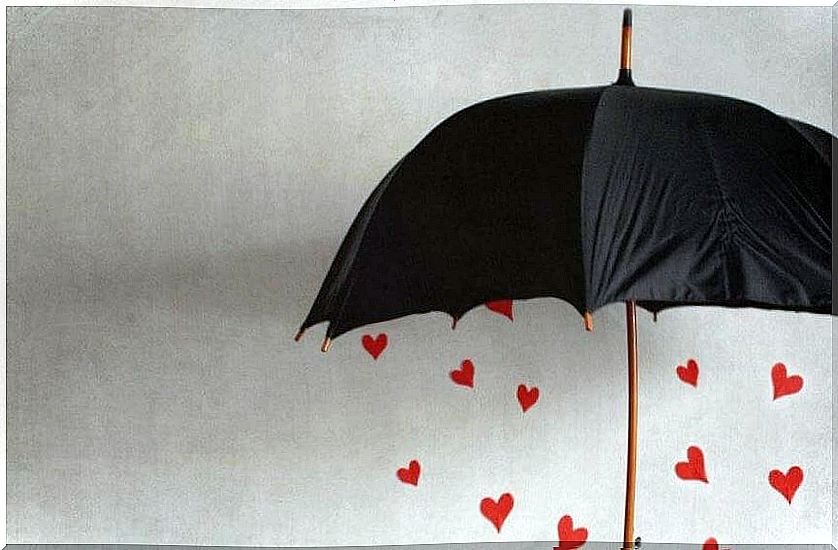 Umbrella with hearts symbolizing the art of doing good