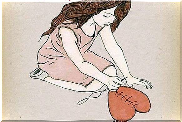 girl sewing heart