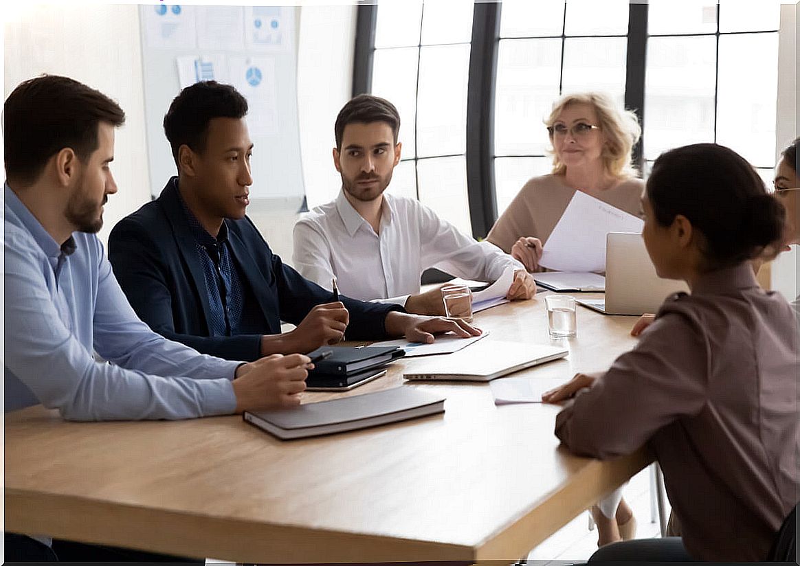 Work team thinking of hiring more people with autism