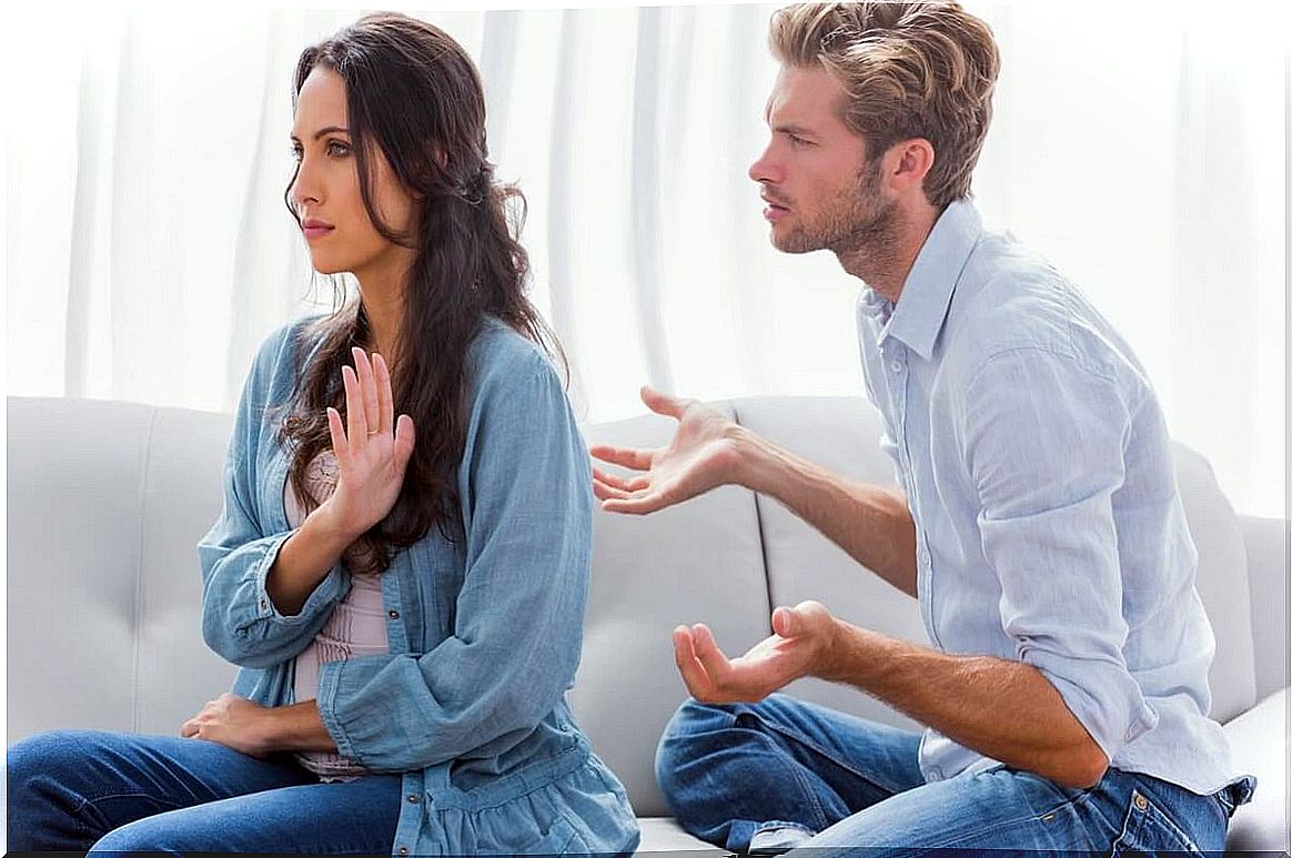 Angry couple representing how to avoid sabotaging your relationship