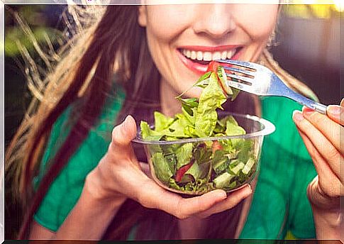 Woman eating a salad