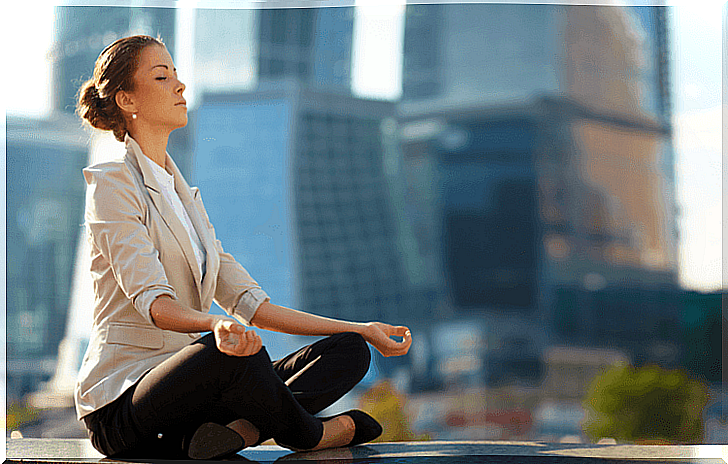 Woman meditating at work