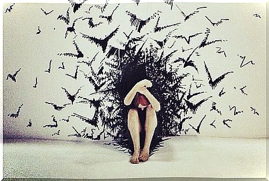 woman wrapped in birds symbolizing impact bias