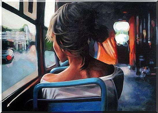 woman from behind sitting on a bus