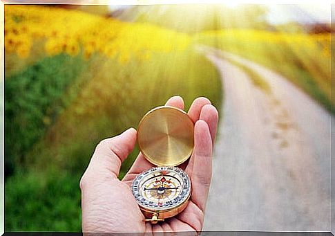 Hand with a compass