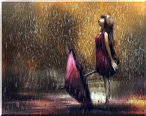 Girl looking at the rain