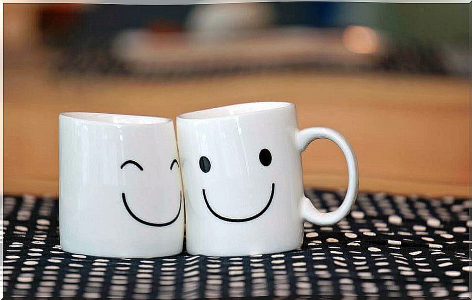 Two mugs with smiley face