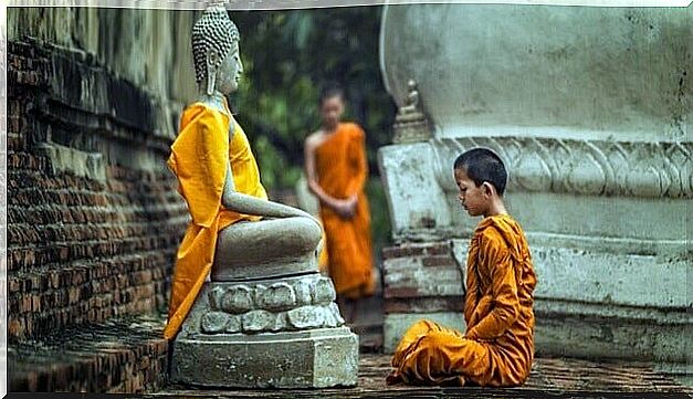 Child before Buddha