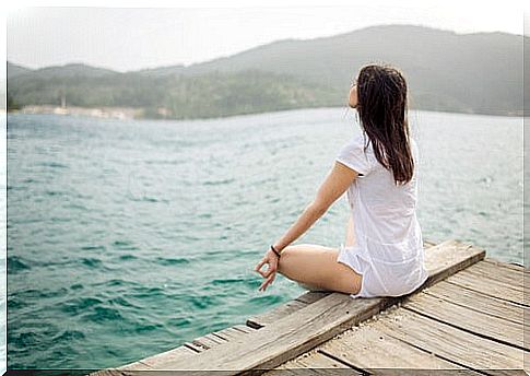 Woman meditating and practicing anchor technique