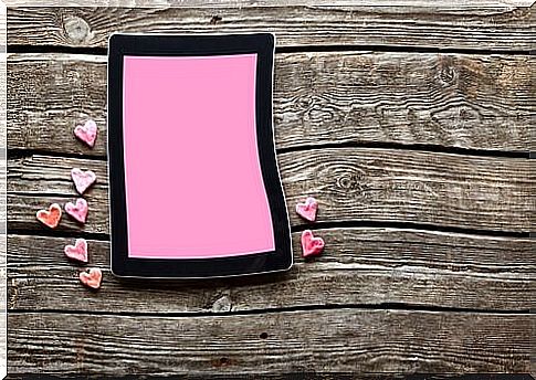 Pink tablet symbolizing cyber relationships