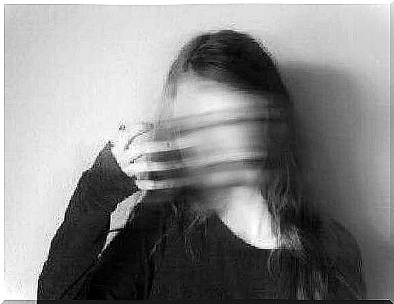 Woman with blurred face