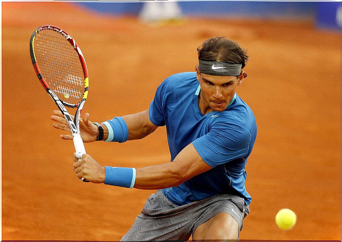 Rafael Nadal playing tennis