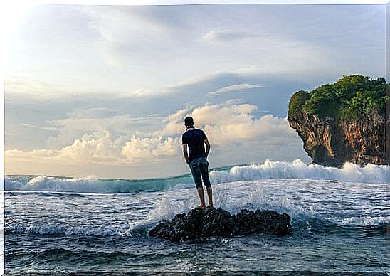 Man in front of sea