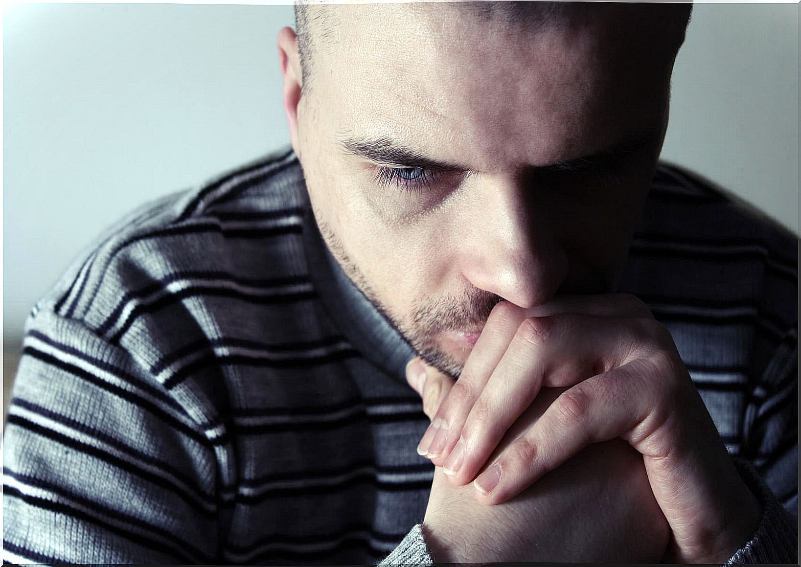 Man wondering why sadness lasts longer than other emotions?